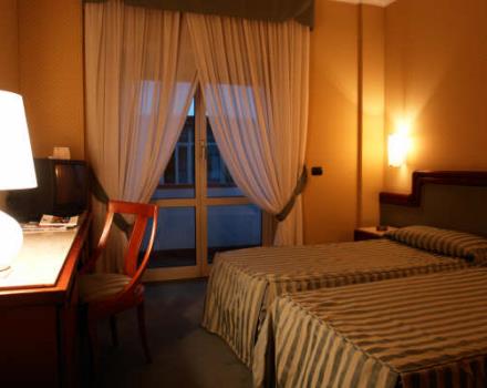 ナポリのBW Signature Collection Hotel Paradisoの快適な客室をみる